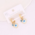 Detail shot of heart-shaped stainless steel earrings with evil eye motif on packaging - Evil Eye Heart Style (6#)