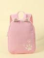 Pink corduroy kids backpack with cute 3D ears and cat paw print on beige background - Pink