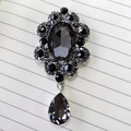 Vintage black crystal gemstone brooch with floral metal design and teardrop pendant - Antique Silver Grey Gem Pendant