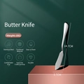 Polished 18g stainless steel butter knife, 14.7cm long with mirror finish on pink stand - Butter Knife