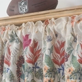 Floral linen cafe curtain with red and blue flower patterns hanging on a wooden rod - 150x45cm / Symmetrical Flowers Tassel Rod Pocket Tier