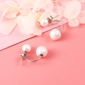 Elegant S925 silver double pearl jacket earrings in silver finish on pink background - 925 Silver / White