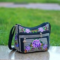 Detailed embroidery on a black canvas crossbody bag with multiple zipper compartments - Lotus Flower Purple