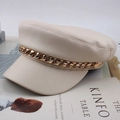 Detail of beige PU leather flat top cap with gold chain accent and textured finish - One Size 58cm / Beige Diamond Chain Style