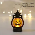 Close-up of a vintage Halloween pumpkin lantern with black base and silver handle - Pumpkin Lantern B (Angry Face)