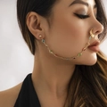 Detailed close-up of exotic gold nose to ear chain with colorful gemstones on a female model - Colorful Rhinestone Gold (E3023)