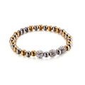 Pulsera elástica con cuentas alternadas en oro y plata y detalles de circonitas - Bicolor
