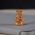 Carved wood rabbit keychain pendant holding a carrot in natural light brown finish - Around 3cm / Rabbit Carving Only
