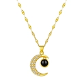Golden crescent moon projection necklace with pavé zircons and black center bead detail - Imitation Gold Moon Projection Style (3157-B)