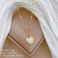 Detailed view of heart shell pendant necklace with weight 4.9g and size 1.6x1.8cm - Gold