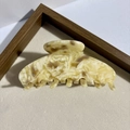 Creamy marble acetate hair claw clip with a sleek large semi-circle design for hair styling - Yellow