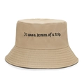 Close-up of khaki cotton bucket hat featuring precise black embroidered text and stitching - One Size / Khaki