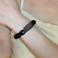 Bracelet à perles noires avec entretoises dorées et breloque Feng Kao Bi Guo - Style Succès aux Examens en Bois de Santal