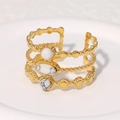Anillo vintage de tres capas en acero dorado con piedras de turquesa blanca y cuentas - Estilo de Textura de Mármol Blanco / Blanco