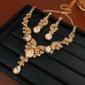Detailed view of luxury gold teardrop necklace and earrings set with champagne crystals - Earrings and Necklace Set (Champagne)
