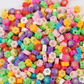 Colorful polymer clay flower beads with smiley face patterns for DIY jewelry making - Smiling Sun Flower