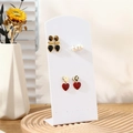 L-shaped acrylic jewelry display stand with 72 holes for earring organization - All White