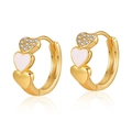 Macro detail of 18K gold heart hoop earrings with white enamel and sparkling zircons - White Triple Heart (KE0717-2)