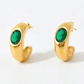 Golden C-shaped stainless steel earrings featuring an oval green zircon stone - Gold Base Green Stone (KDE859)