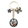 Golden keychain with dark blue enamel pendant featuring moon and butterfly charms - Black Butterfly Flower (ER693)