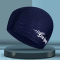 Dark blue fabric swim cap with white side logo on a minimalist round base - Blue