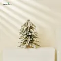 Miniature flocked Christmas tree with warm LED lights and a natural wooden base - Snow Flocked Naked Tree With LED Lights