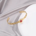 Golden stainless steel C-shaped cuff bracelet with red stone and sunburst pattern - Red Starburst (B01997-19)
