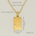 Macro detail of gold tarot necklace pendant with heart and star moon engravings - Heart Style (383)