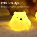 Polar bear cartoon night light with warm yellow glow 11cm height on white carpet - Bear / H11cm x W10.5cm