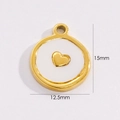 Macro detail of a 12.5mm gold titanium steel round pendant with white shell heart inlay - Round Inlay Gold Heart