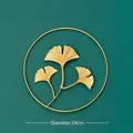 Modern gold ginkgo leaf wall decor in circular frame with a diameter of 24cm - Gold - Ginkgo Leaf / Diameter 24cm