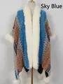Sky blue knit shawl poncho with white faux fur collar and decorative pom-poms - Blue and Yellow