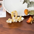 Yellow acetate flower hair claw clip with rhinestones in marble texture finish - Amber White