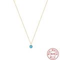 Detailed macro view of an 18K gold-plated S925 sterling silver turquoise pendant necklace - Single Bead Turquoise Pendant / Gold #4 (Single Bead)