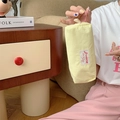Handbeeld van een compacte gele stoffen opbergtas in macaron-stijl met ritssluiting - Citroengeel