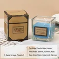 Freesia scented candle in a blue candy-colored glass jar with a matching gift box - Blue Freesia