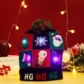 Knitted Christmas beanie with LED lights and festive patterns including HO HO HO text - Black HOHO Snowman