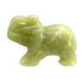 Natural green jade elephant figurine with translucent texture and white stone veins - Xiu Jade / 1.5 Inches