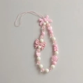 Close-up of pink and white beaded phone charm with bow, heart and bear shapes - Pink Bow Style Phone Chain