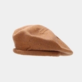 Macro detail of the caramel knit beret showing high-quality wool texture and rolled edge - One Size / Orange
