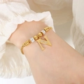 Elegante goudkleurige kralenarmband met kristallen letter N hanger voor dames sieraad luxe - Gouden Armband - Letter N
