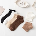 Mid-tube cable knit socks for women with ruffled cuffs in black, white, and beige tones - No-Show Socks / Multicolor Combo