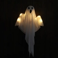 Hanging Halloween ghost decoration with white fabric and warm LED lights on dark wood background - Warm Light-Glowing Ghost