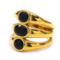 Detail of a triple-layered gold band ring featuring oval and round black zircons - US 6 / Gold Black Zirconia