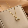 Golden elephant pendant necklace with white crystals and red gemstone eye on silk background - 43#xl1548-13 Little Elephant