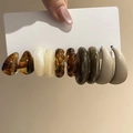 Close-up of five pairs of minimalist C-shape acrylic earrings in various colors - 5-Pair Set: Brown/Beige/Green/Grey