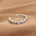 Adjustable silver Evil Eye ring with blue stones on a premium silk texture background - Evil Eye Chain Link Style (Q-J080) / White Gold