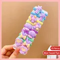 Close-up of 10 macaron-colored elastic towel hair ties for kids on display card - Purple Series (10 Pcs)