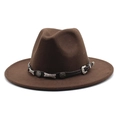 Macro shot of dark brown felt fedora with a Western-style leather band and silver buckle - Coffee