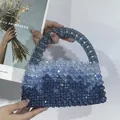 Macro shot of blue gradient beaded handbag showing intricate handmade weaving detail - Gradient Blue